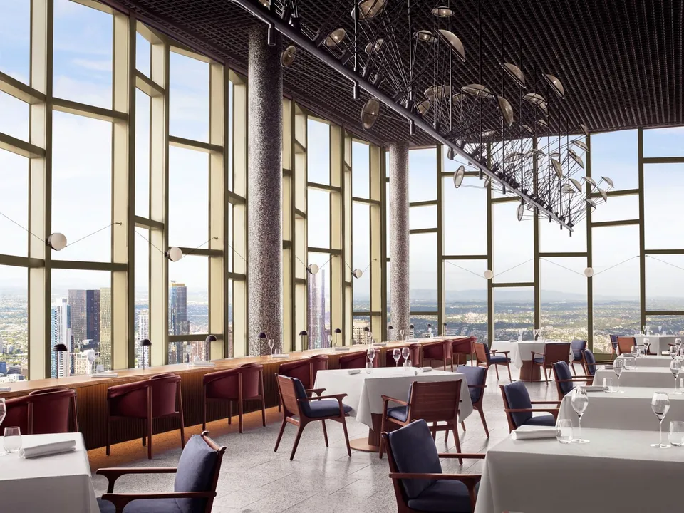 Atria restaurant on level 80, with double-height windows framing the Melbourne skyline