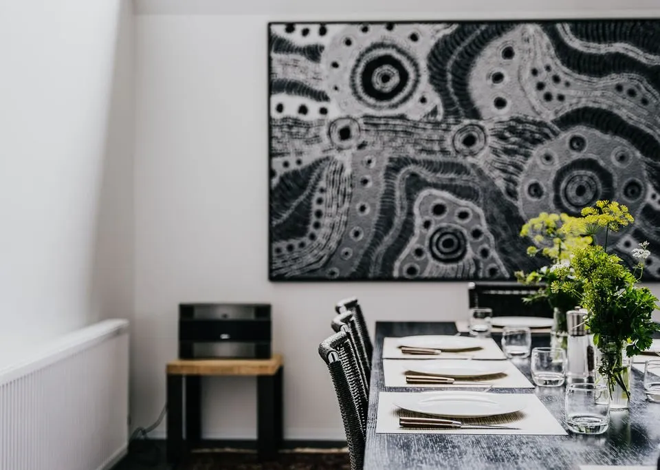 Dining area with indigenous Australian artwork