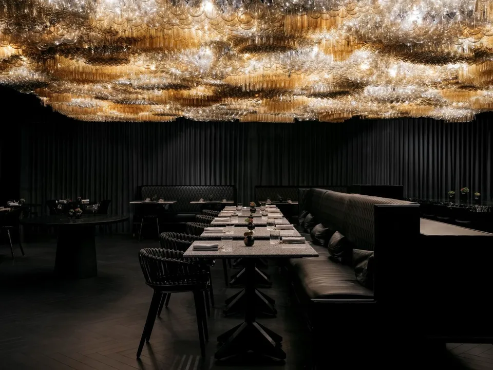 Doot Doot Doot beneath its signature 10,000-globe chandelier