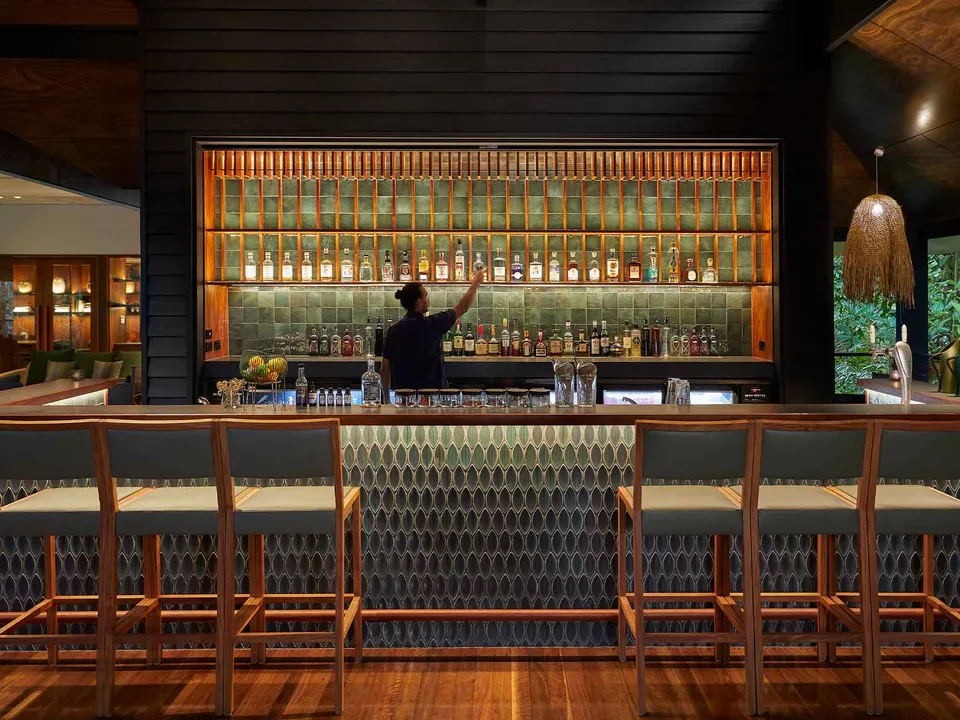 The open-air Treehouse Restaurant set among the rainforest canopy