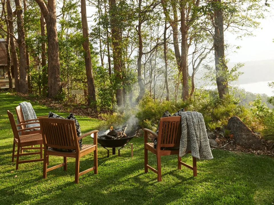 Lake deck and fire pit at sunset
