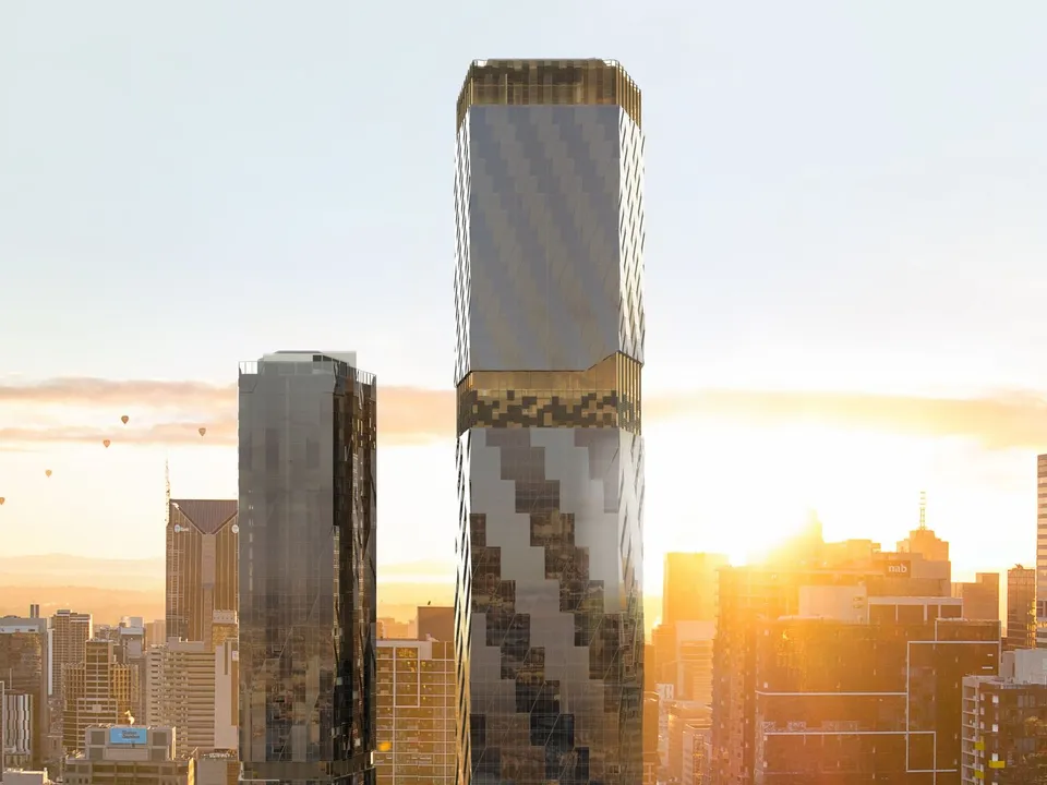 Australia 108, home to The Ritz-Carlton Melbourne, rising above the city skyline at sunset