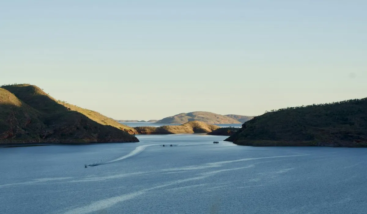 Late afternoon light on a Kimberley lake between rugged hills