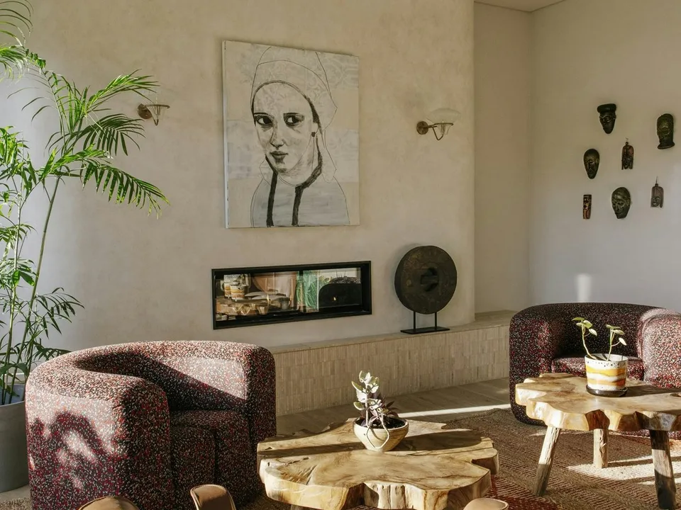 The Library with fireplace and curated art