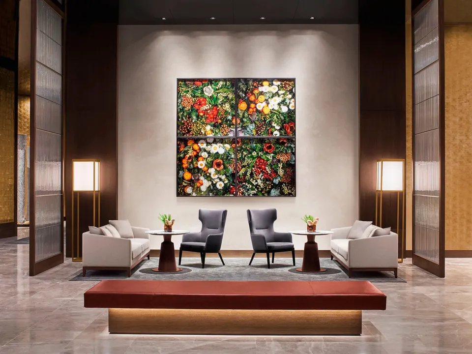 The ground floor lobby with its striking floral art installation and marble finishes