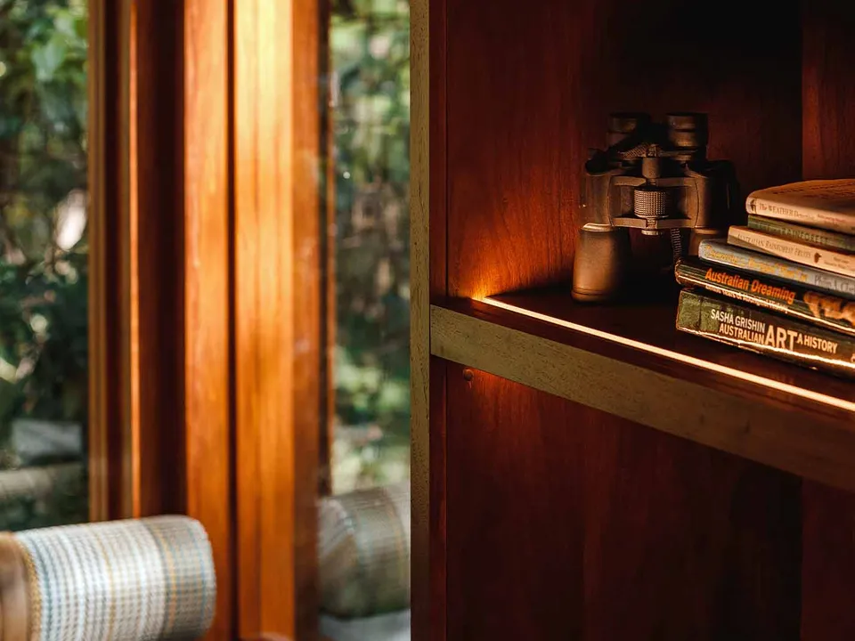 The lodge's lagoon-style pool framed by tropical gardens