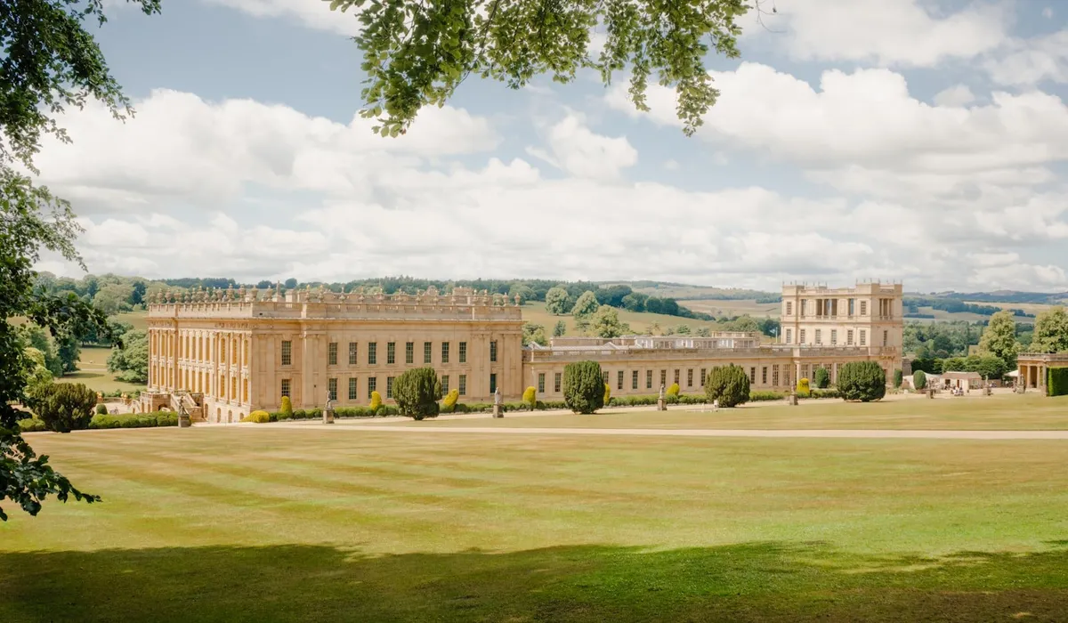 Grand heritage estate house with manicured lawns and gardens