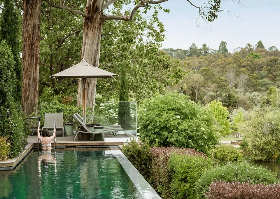 The solar-heated infinity pool overlooking Lake Daylesford