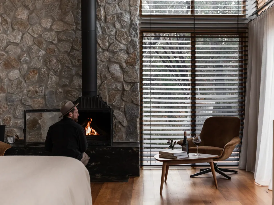 Studio Chalet with stone fireplace, king bed, and bushland views