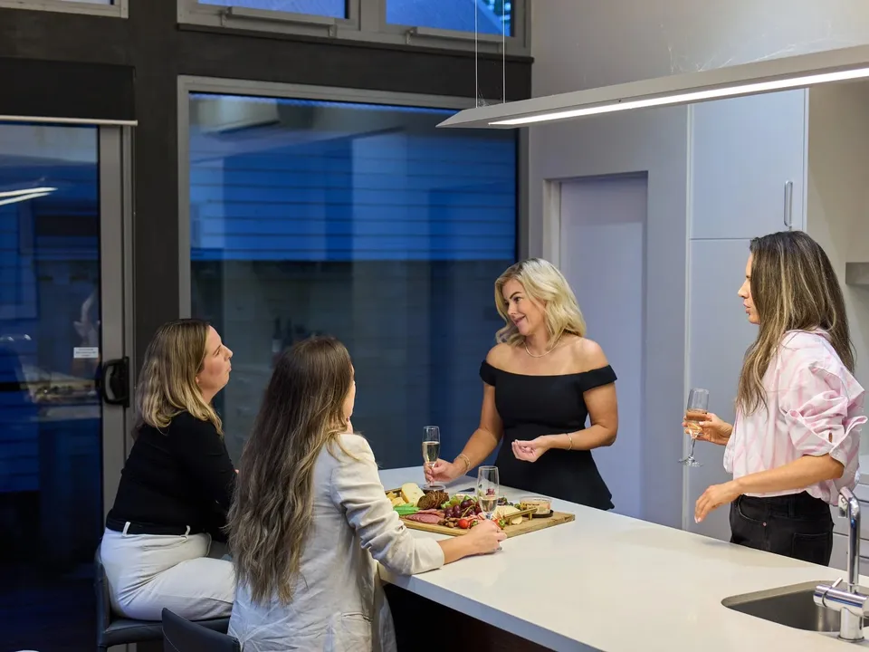 Modern kitchen and living area in a Grove House villa