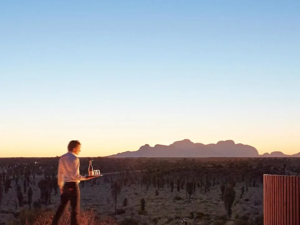 Sunset drinks with Kata Tjuta on the horizon