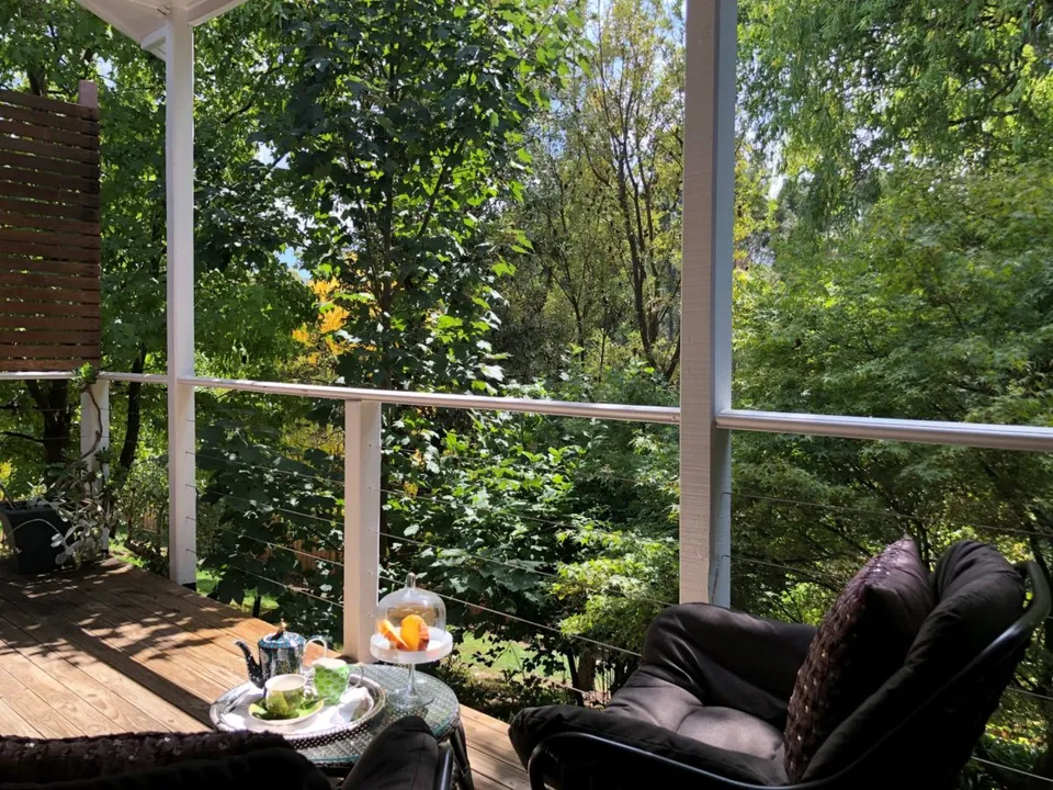 Private balcony breakfast overlooking native bush